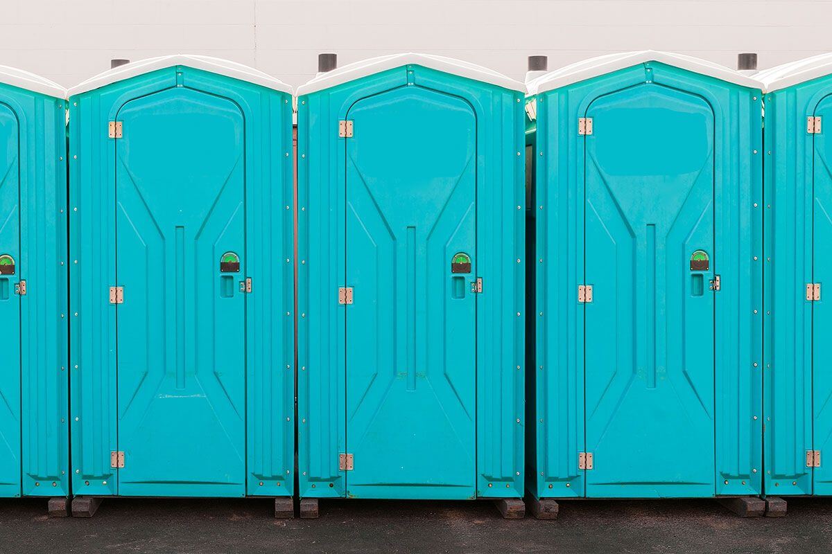 Industrial portable restroom units at a plant in Kankakee, Illinois